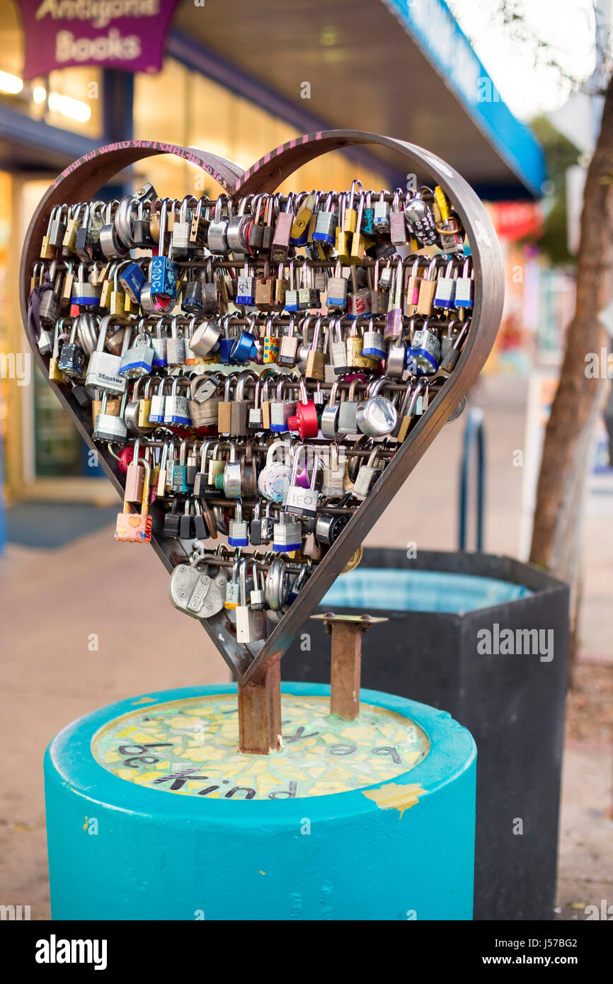 Tucson, Arizona - Lock Your Love sculpture on Fourth Avenue. Sweethearts inscribe their names on a local, place it on the sculpture, and throw away th Stock Photo
