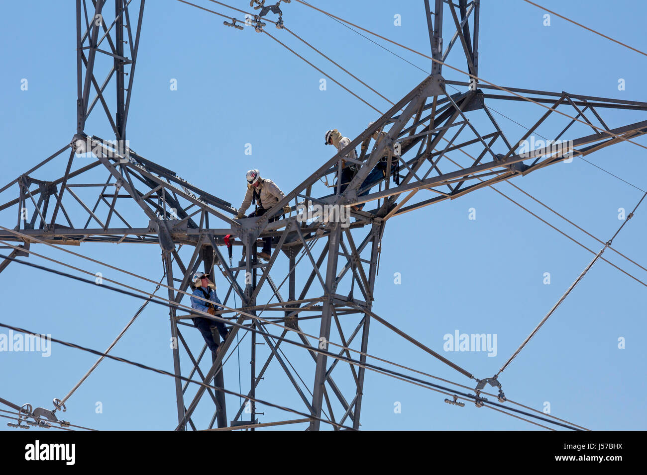 Tucson, Arizona Workers on a high voltage electrical transmission