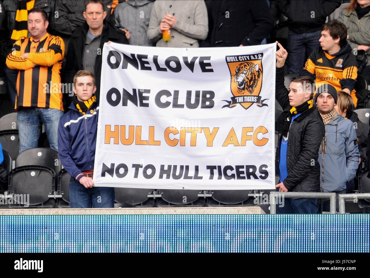 HULL CITY FANS WITH PROTEST FL HULL CITY FC V LIVERPOOL FC KC STADIUM HULL ENGLAND 01 December 2013 Stock Photo