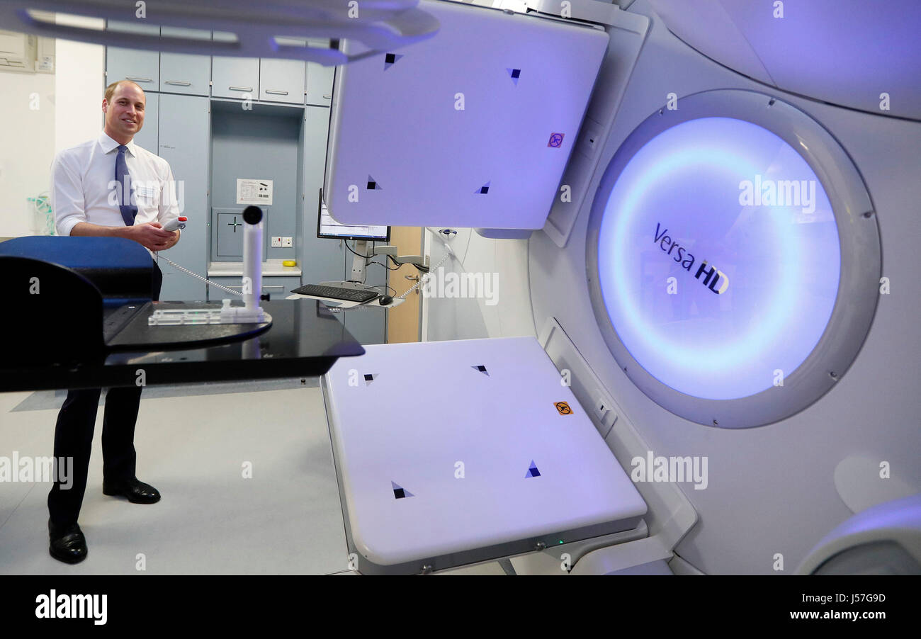 The Duke of Cambridge is shown a Linear excelerator in the radiotherapy unit during a visit to the Royal Marsden NHS Foundation Trust in Sutton, Surrey, marking 10 years since he became president of the centre. Stock Photo