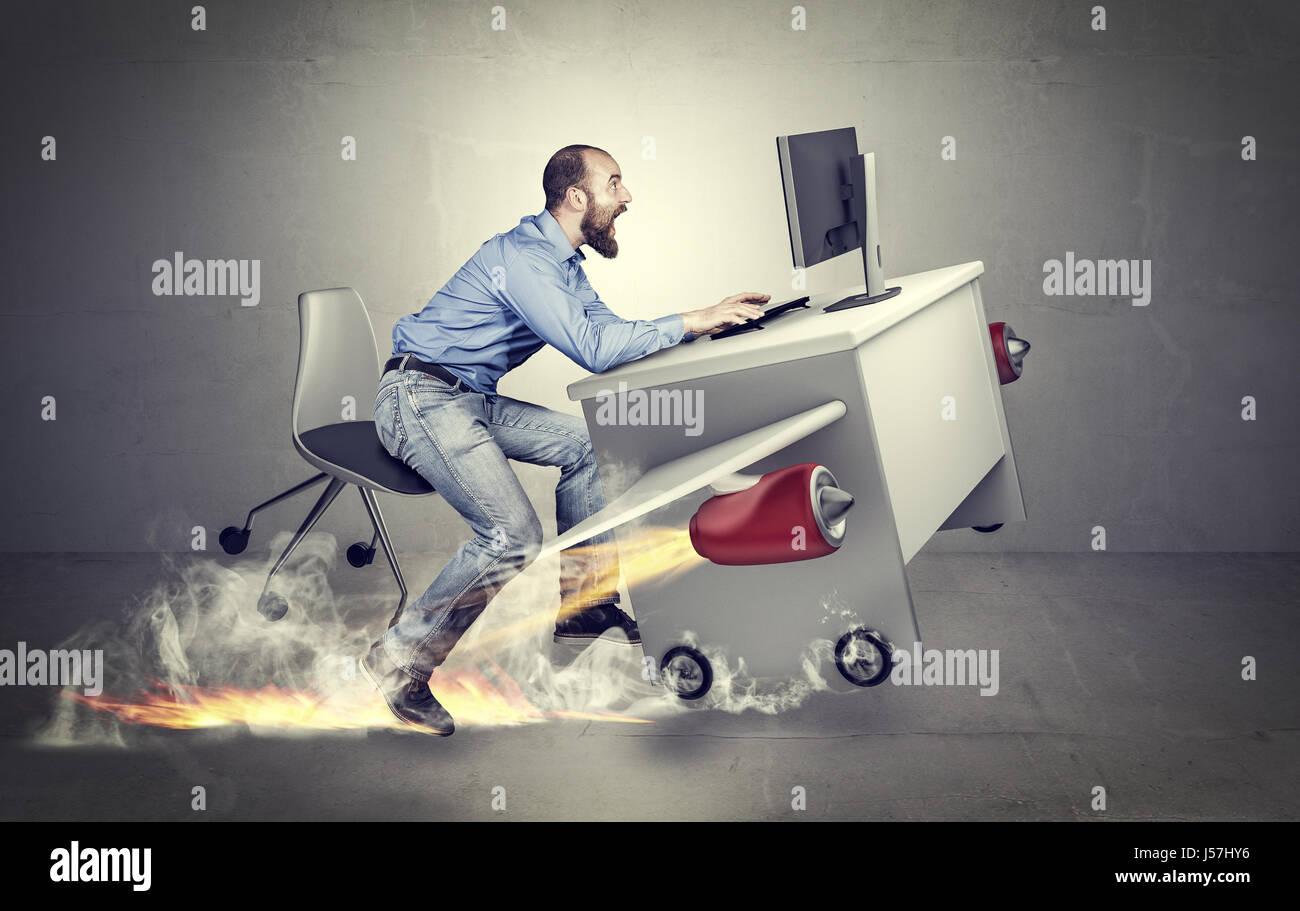 conceptual image, methaphor of busy and fast business, man with airplane desk Stock Photo