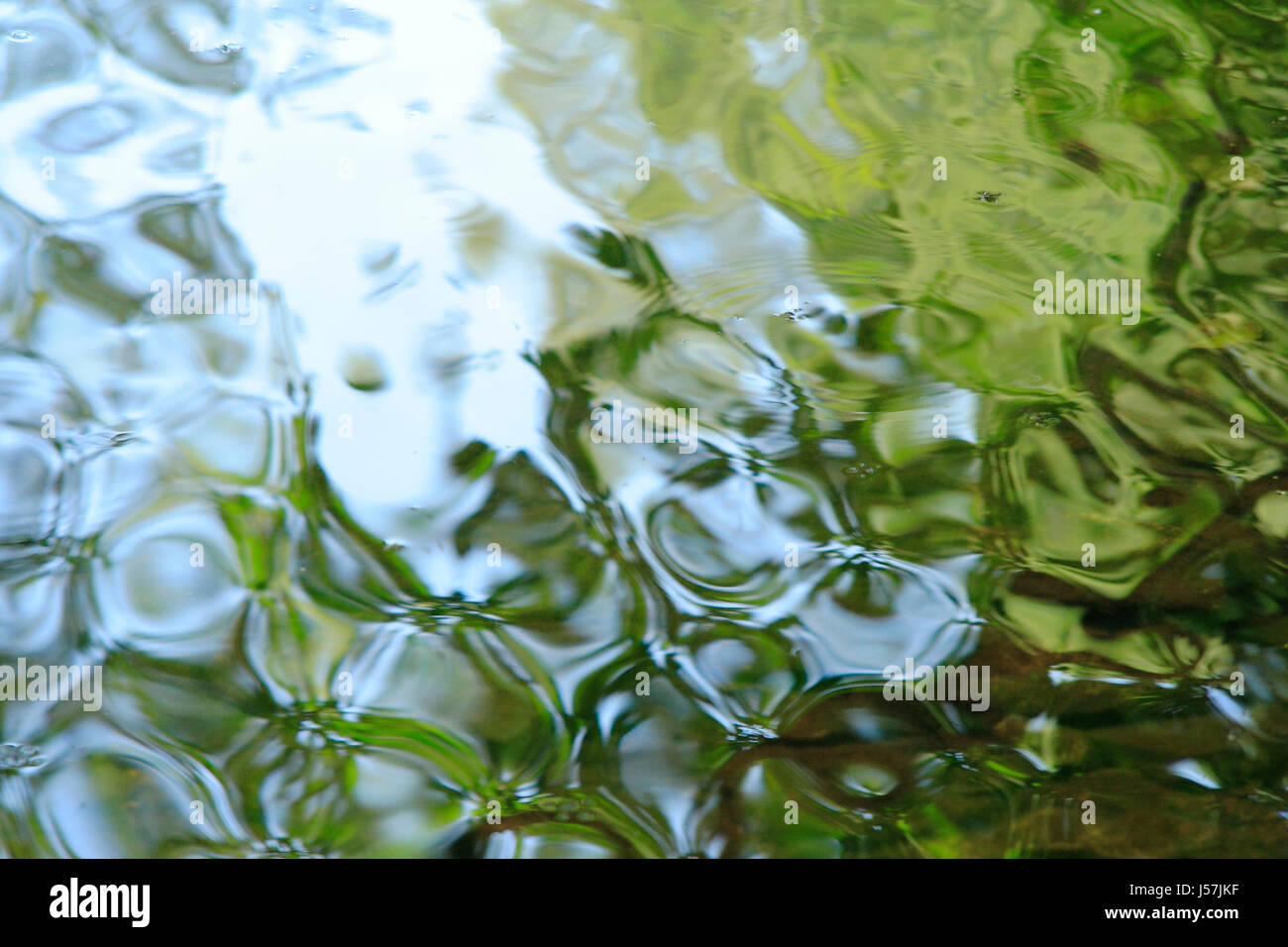 Ccoloured water reflections. Stock Photo