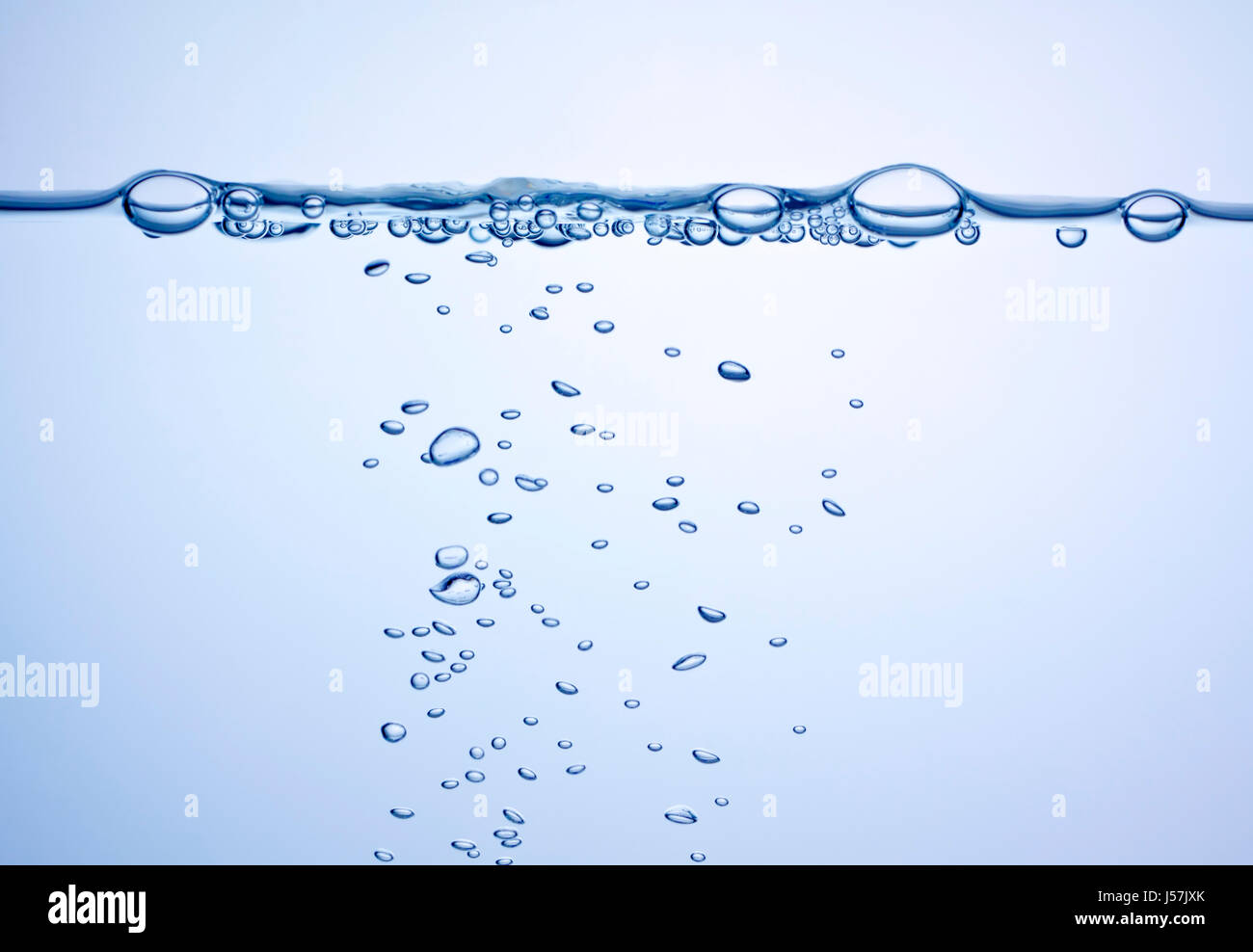 Waterline with air bubbles. Backlight, blue tint. Stock Photo