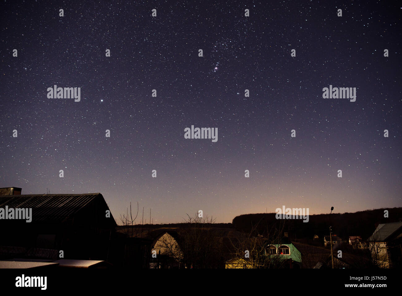 wooden house on a background of the night sky Stock Photo - Alamy