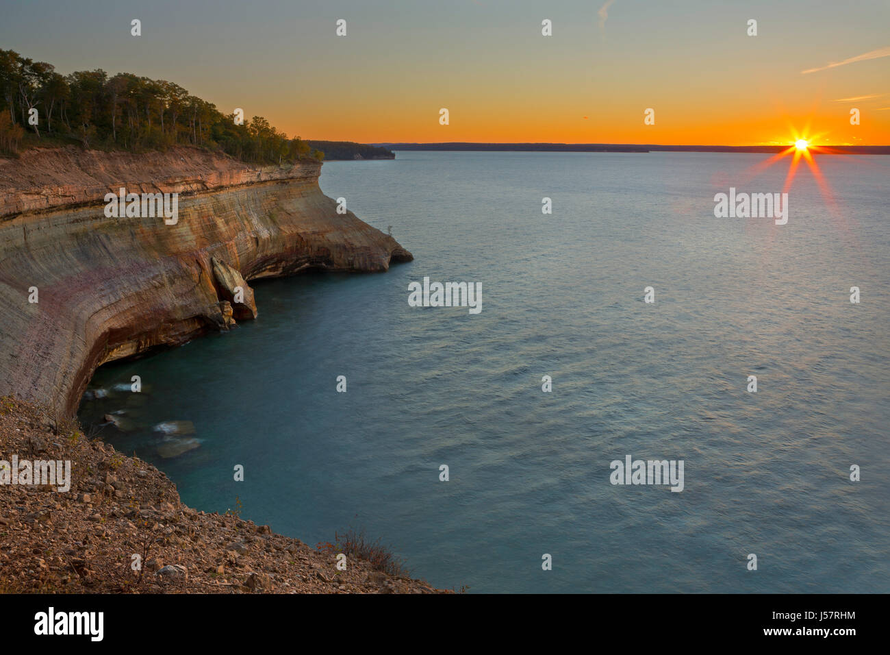 Sunset along the cliffs of Pictured Rocks National Lakeshore in Michigan's Upper Peninsula. USA Stock Photo