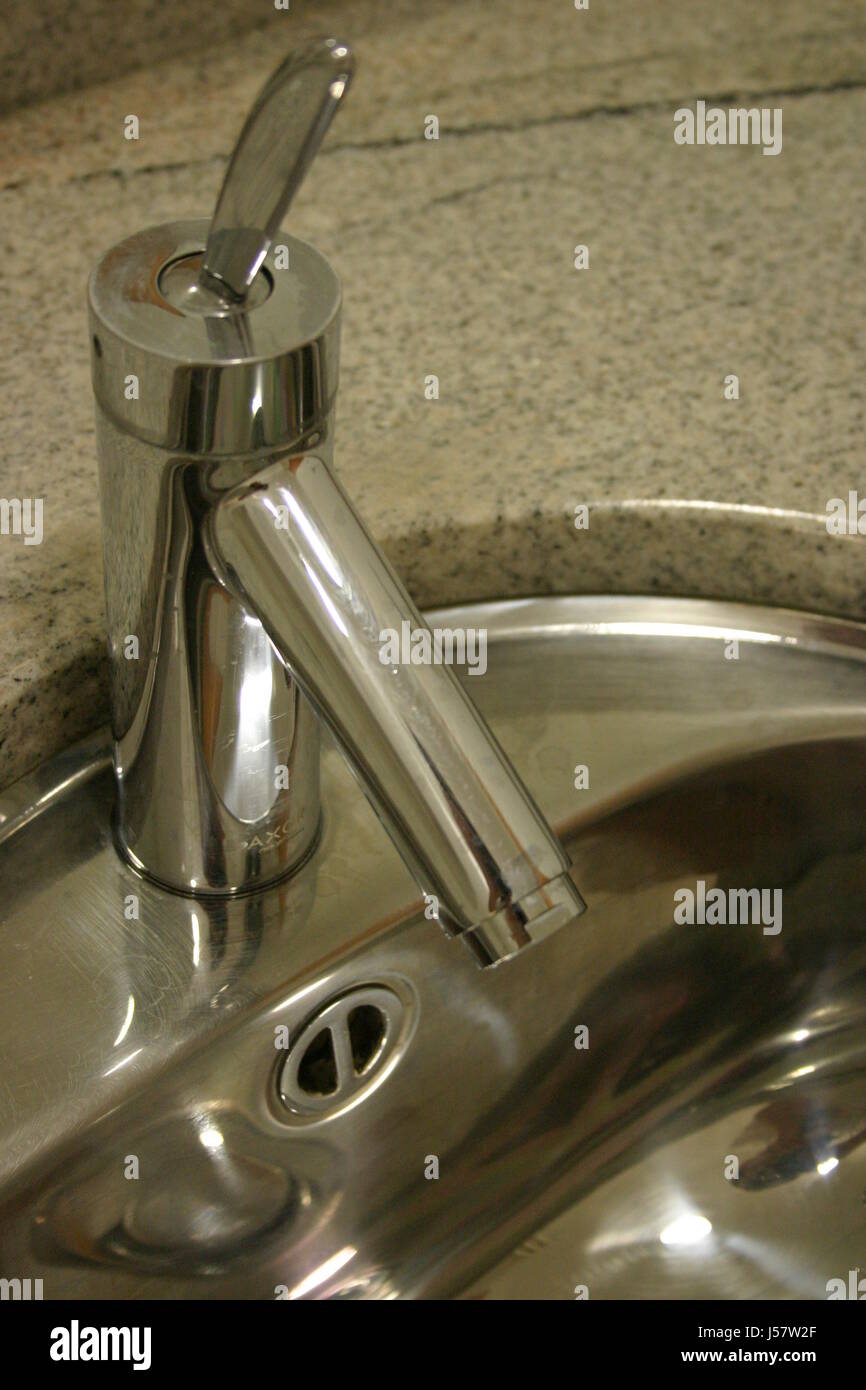 bright shiny wash basin tap wash hand basin bathroom clean toilet water