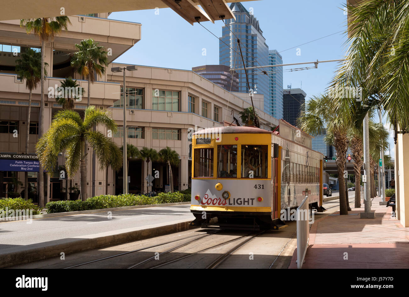 Yellow streetcar at the Grego Plaza stop in Downtown Tampa USA. April 2017 Stock Photo