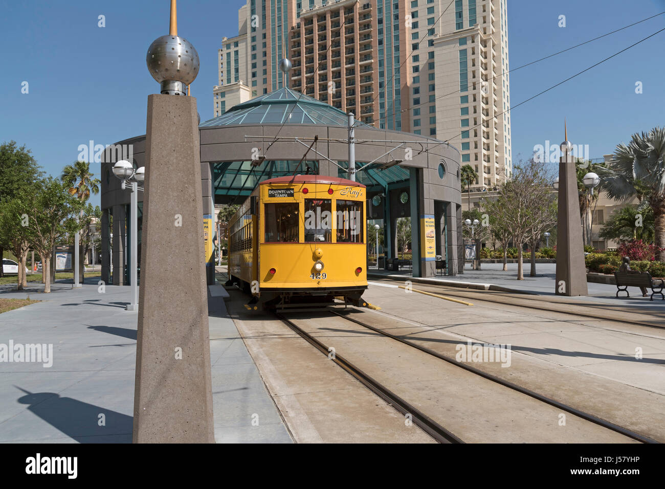 Yellow streetcar at the Grego Plaza stop in Downtown Tampa USA. April 2017 Stock Photo