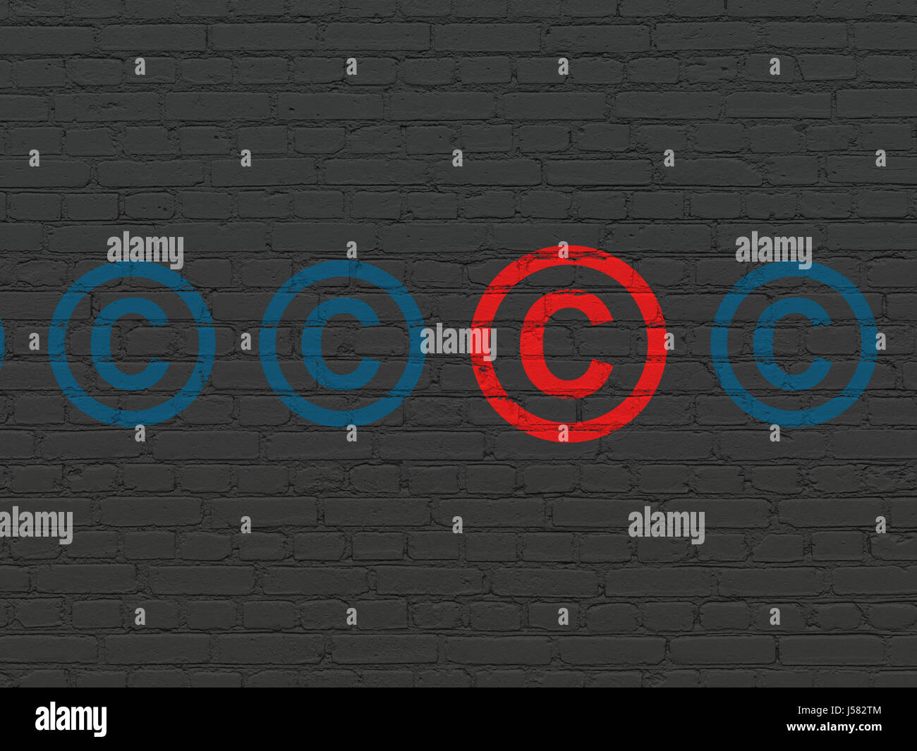 Law concept: copyright icon on wall background Stock Photo - Alamy