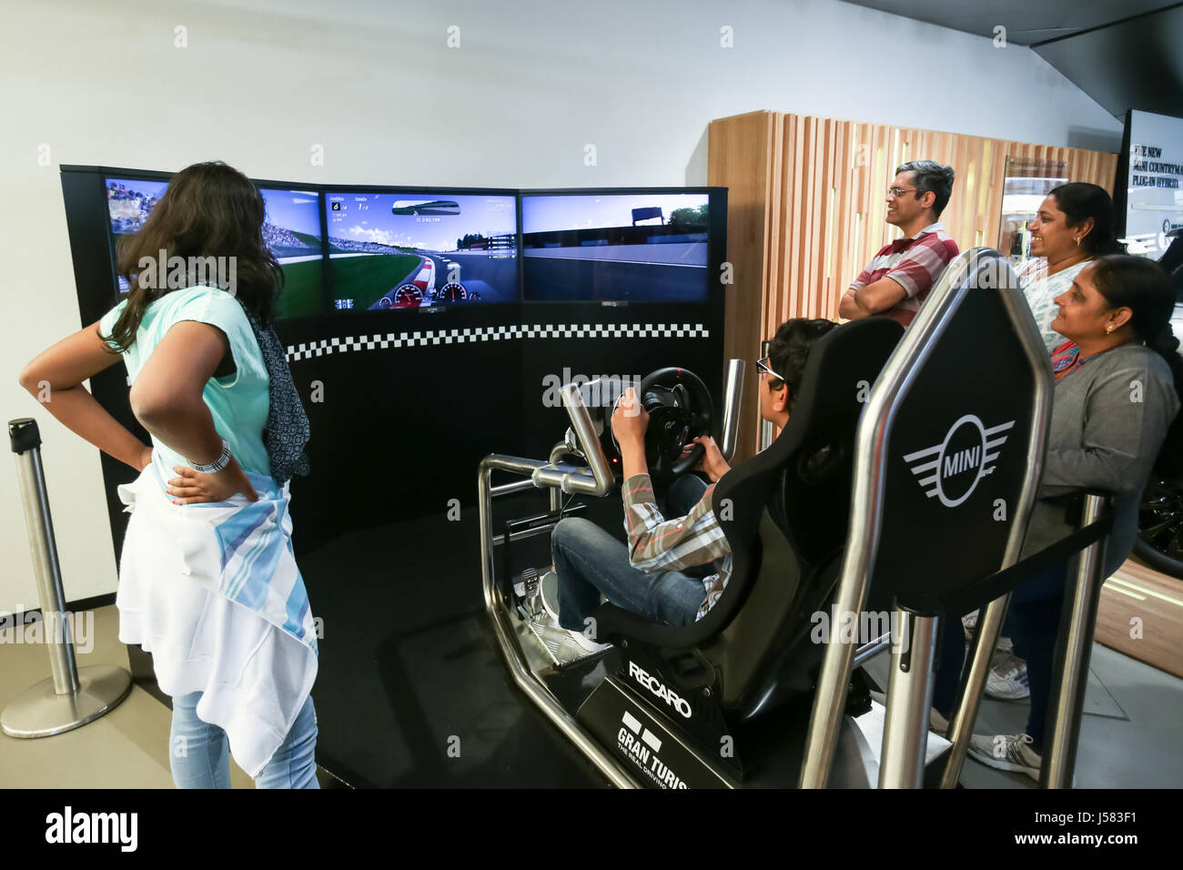 MUNICH, GERMANY - MAY 6, 2017 : People trying out the BMW car driving  simulator in the BMW Welt exhibition center next to the BMW Museum in  Munich, Ge Stock Photo - Alamy