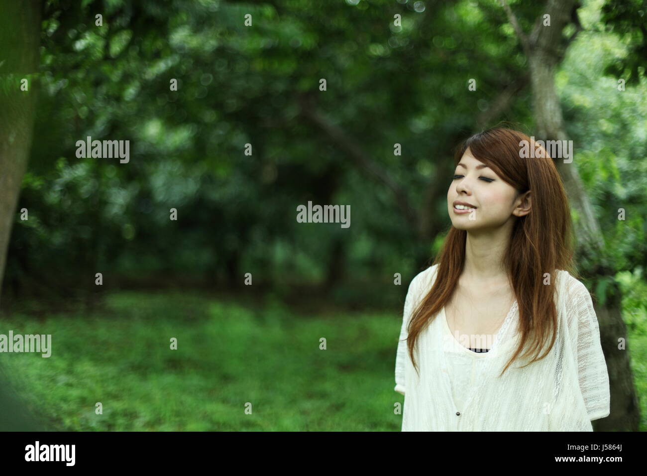 Young woman taking a walk Stock Photo - Alamy
