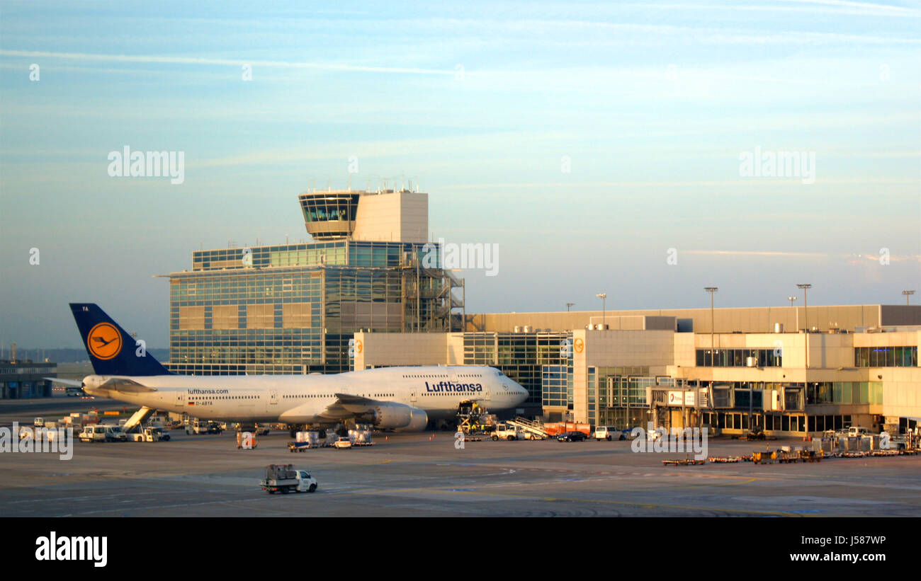 FRANKFURT, GERMANY - SEPTEMBER, 2014: Terminal 1 with passengers airplane docking. This is the view from Lufthansas First Class Lounge Stock Photo