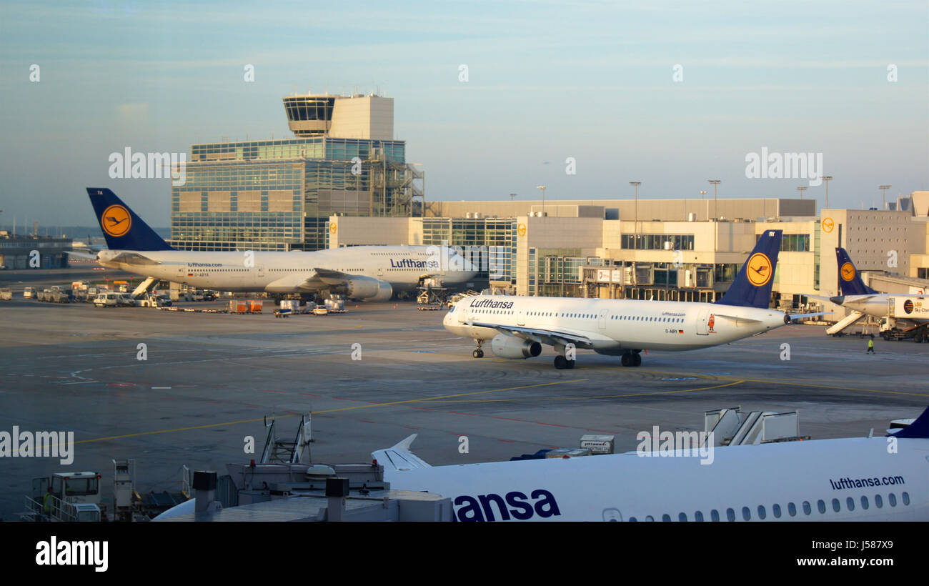 FRANKFURT, GERMANY - SEPTEMBER, 2014: Terminal 1 with passengers airplane docking. This is the view from Lufthansas First Class Lounge Stock Photo