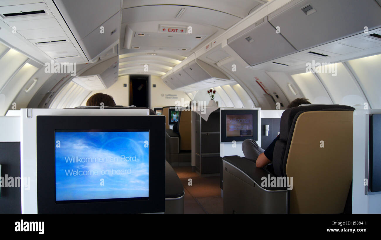 FRANKFURT, GERMANY - SEPTEMBER 2014: Traveling Lufthansa First Class in a Boeing 747-400 Upper Deck Stock Photo