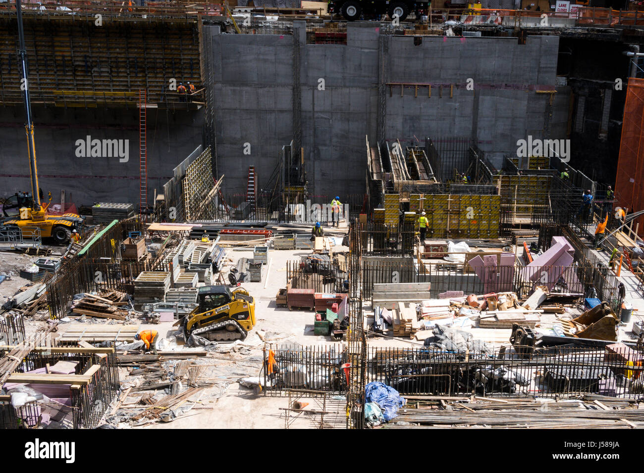 Construction Site in New   with Tradesmen ,York City, USA Stock Photo