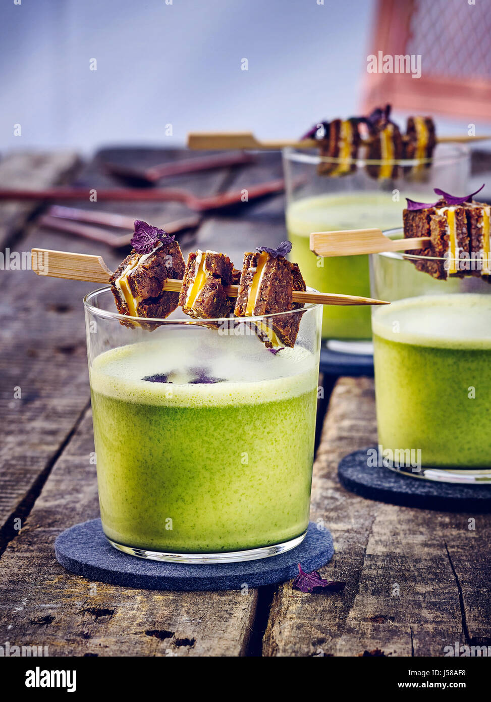 Kale soup with black bread and cheese skewers Stock Photo