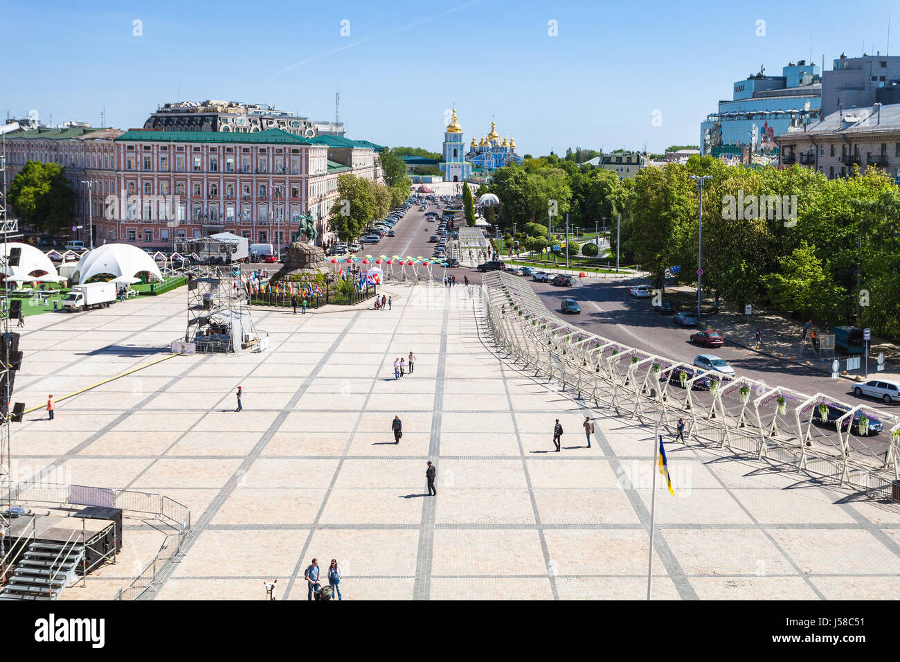 KIEV, UKRAINE - MAY 5, 2017: view of people and monument of Bohdan Khmelnytsky on St Sophia Square and Saint Michael's Golden-Domed Monastery in Kiev  Stock Photo