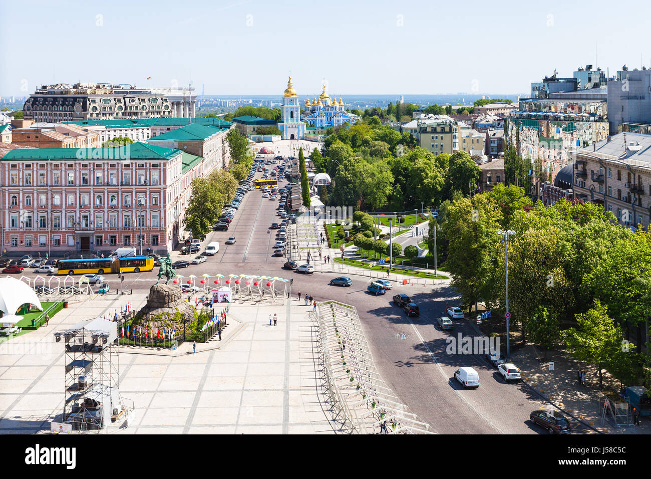 KIEV, UKRAINE - MAY 5, 2017: above view of people and monument of Bohdan Khmelnytsky on St Sophia Square and Saint Michael's Golden-Domed Monastery in Stock Photo