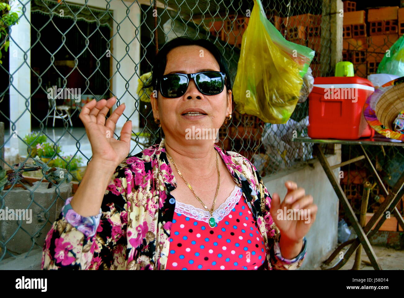 Cool old lady with sunglasses,  Mekong Delta, Vietnam Stock Photo