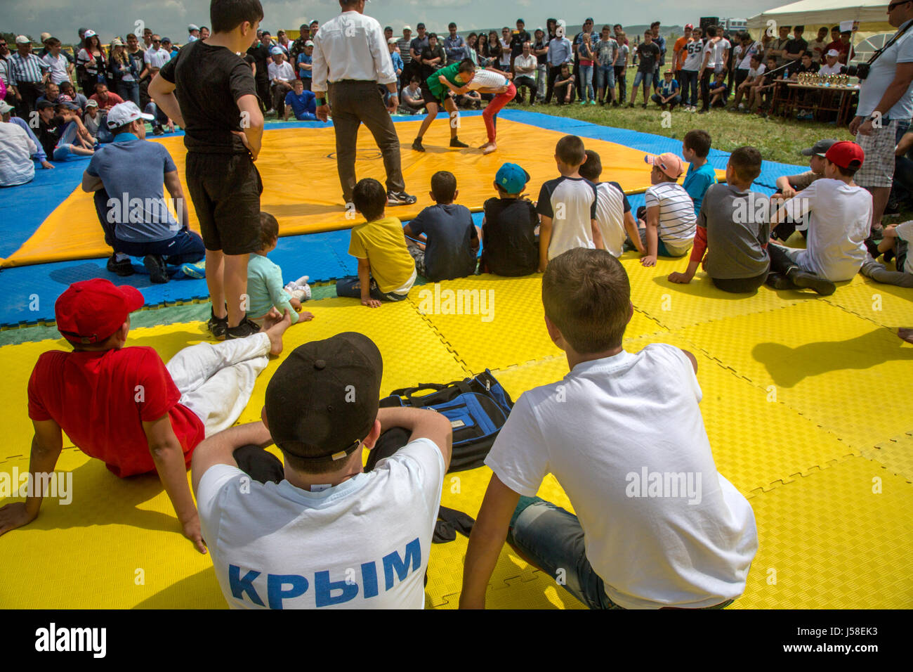 Kurash, a national Crimean Tatar wrestling, held as part of Hidirelez, a celebration of spring and fertility, in Bakhchysarai, Crimea Stock Photo