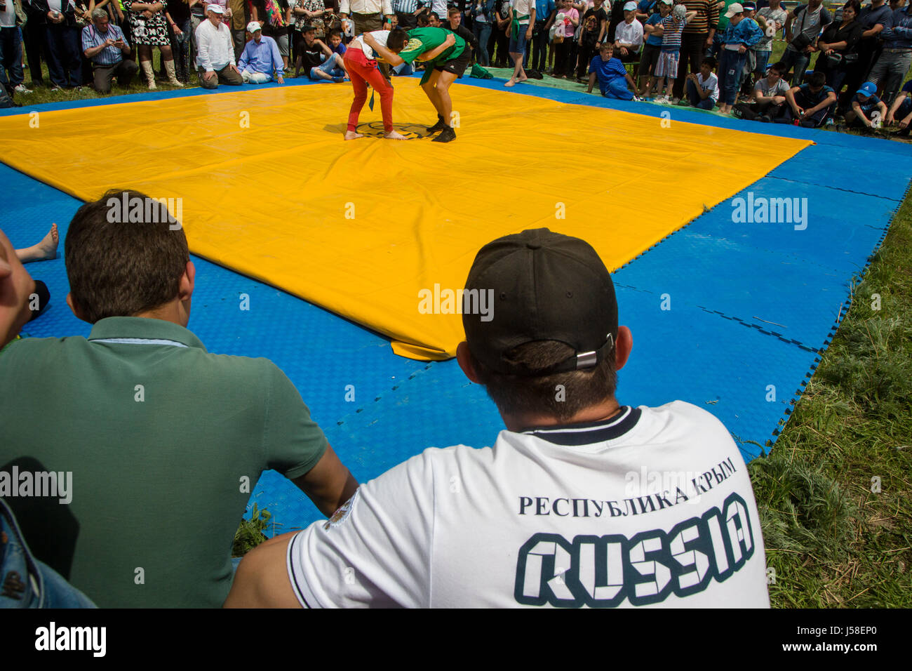 Kurash, a national Crimean Tatar wrestling, held as part of Hidirelez, a celebration of spring and fertility, in Bakhchysarai, Crimea Stock Photo