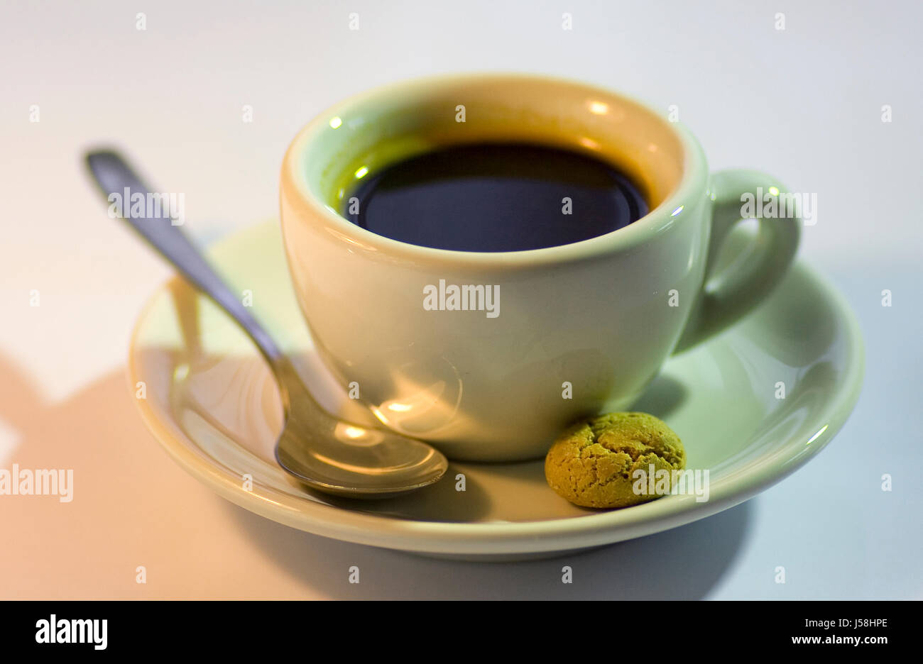 cup strong black swarthy jetblack deep black pastry cookie espresso coffee Stock Photo