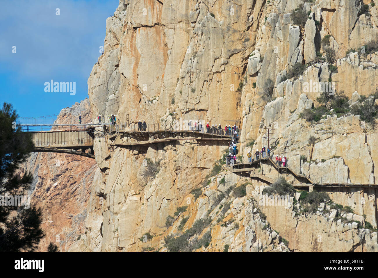 near Ardales, Malaga Province, Andalusia, southern Spain.  Visitors on the El Caminito del Rey or The King´s Walkway. The walkway is built into the si Stock Photo