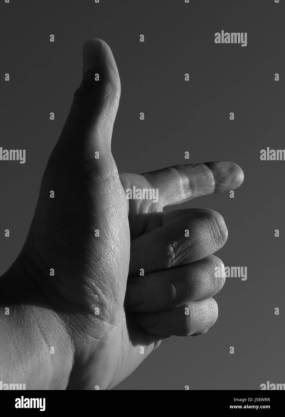 sign signal indicate show interpret hand hands finger emotions skin bw Stock Photo