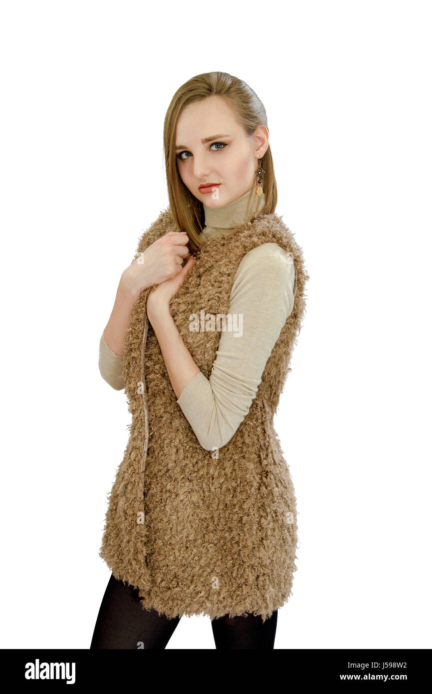 An image of a beautiful young girl in a vest an artificial fur Stock Photo