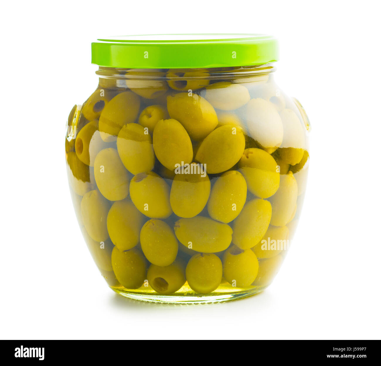 The green olives in jar isolated on white background. Stock Photo