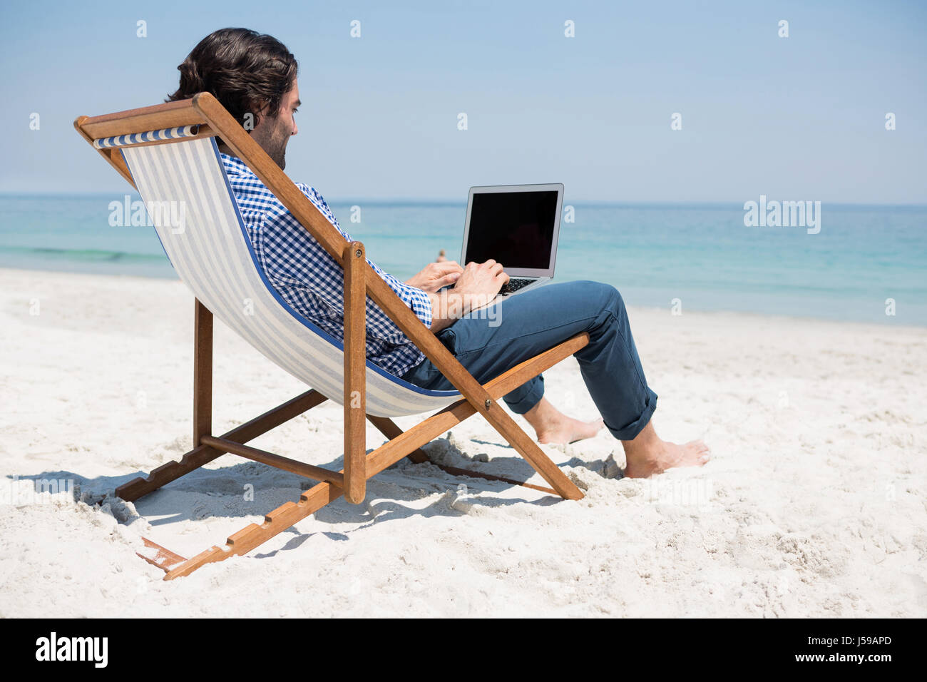 Person Sitting In Beach Chair