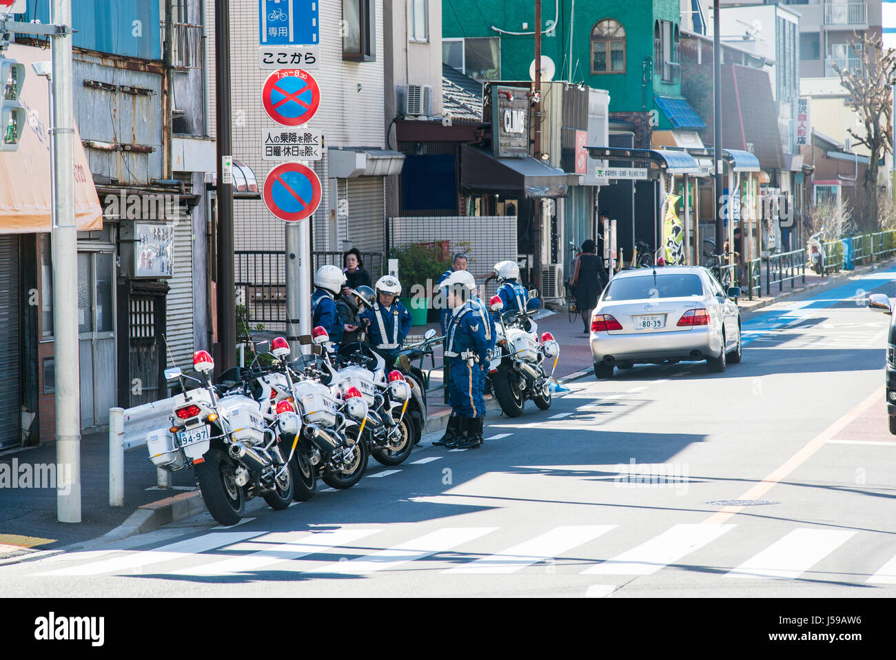 a line of police motorcycles in Tokyo, Japan Stock Photo