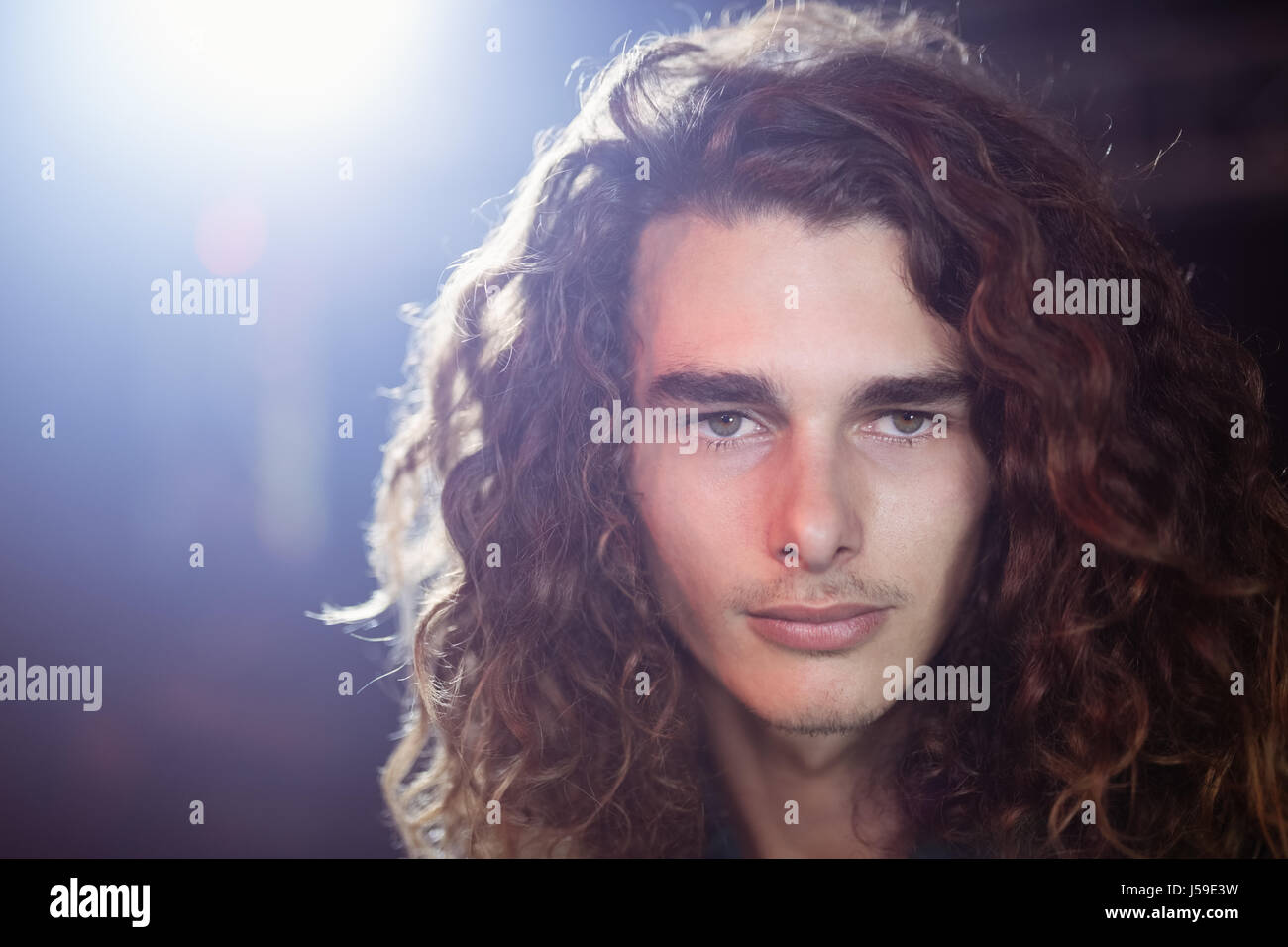 Curly hair brown eyes man portrait hi-res stock photography and images ...