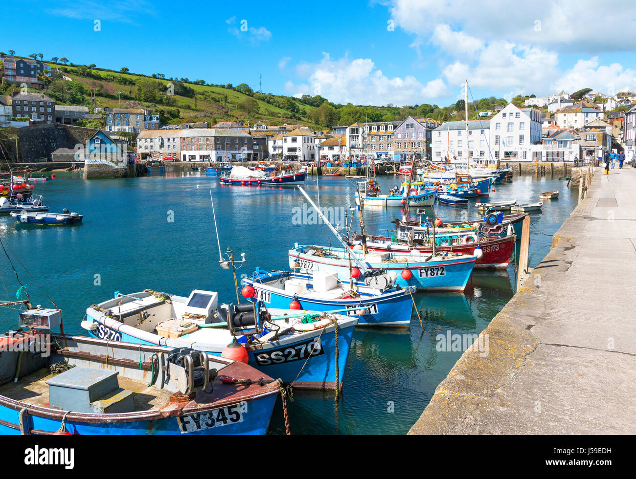 Fishing boats in the harbour at mevagissey, cornwall, england, britain, uk Stock Photo