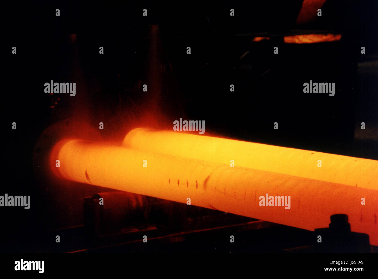 industry iron steel metal heat work factory glow production cast iron steel  Stock Photo - Alamy