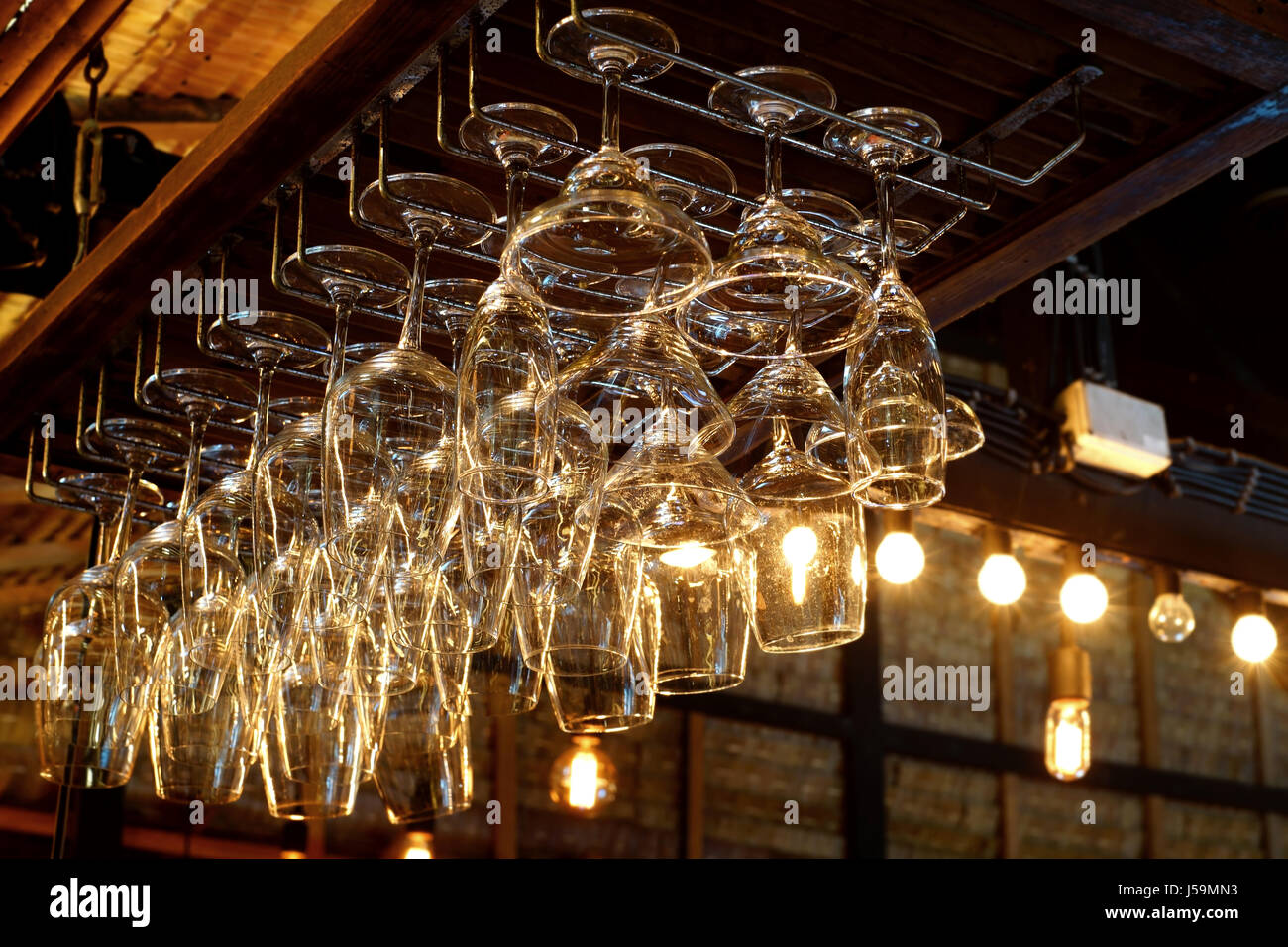pile of empty transparent glasses on shelf Stock Photo - Alamy