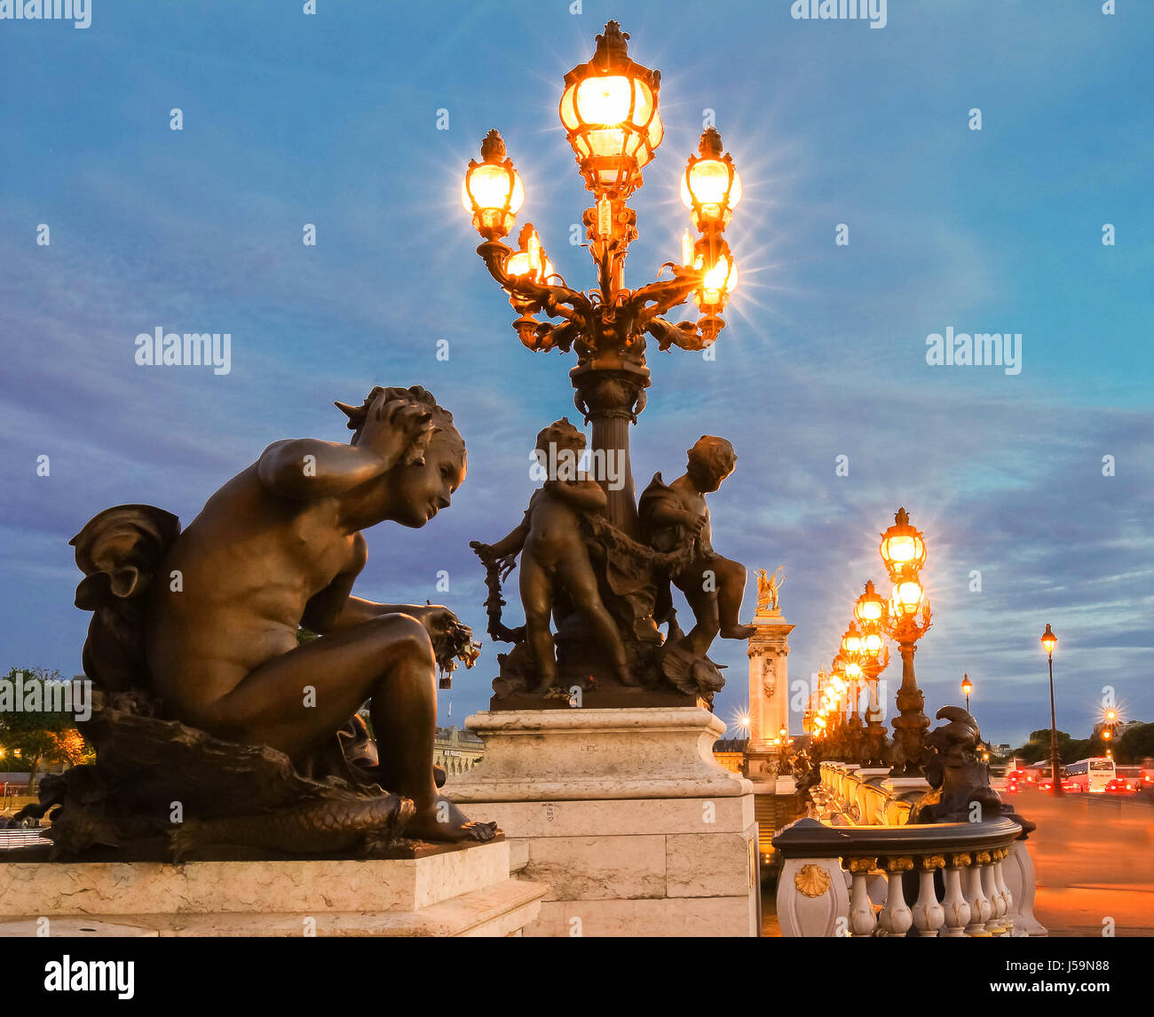 The famous Alexandre III bridge at night, Paris, France. Stock Photo