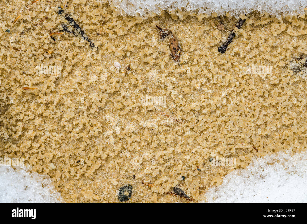 Melting snow on sandy beach of Upper Peninsula, Michigan Stock Photo ...