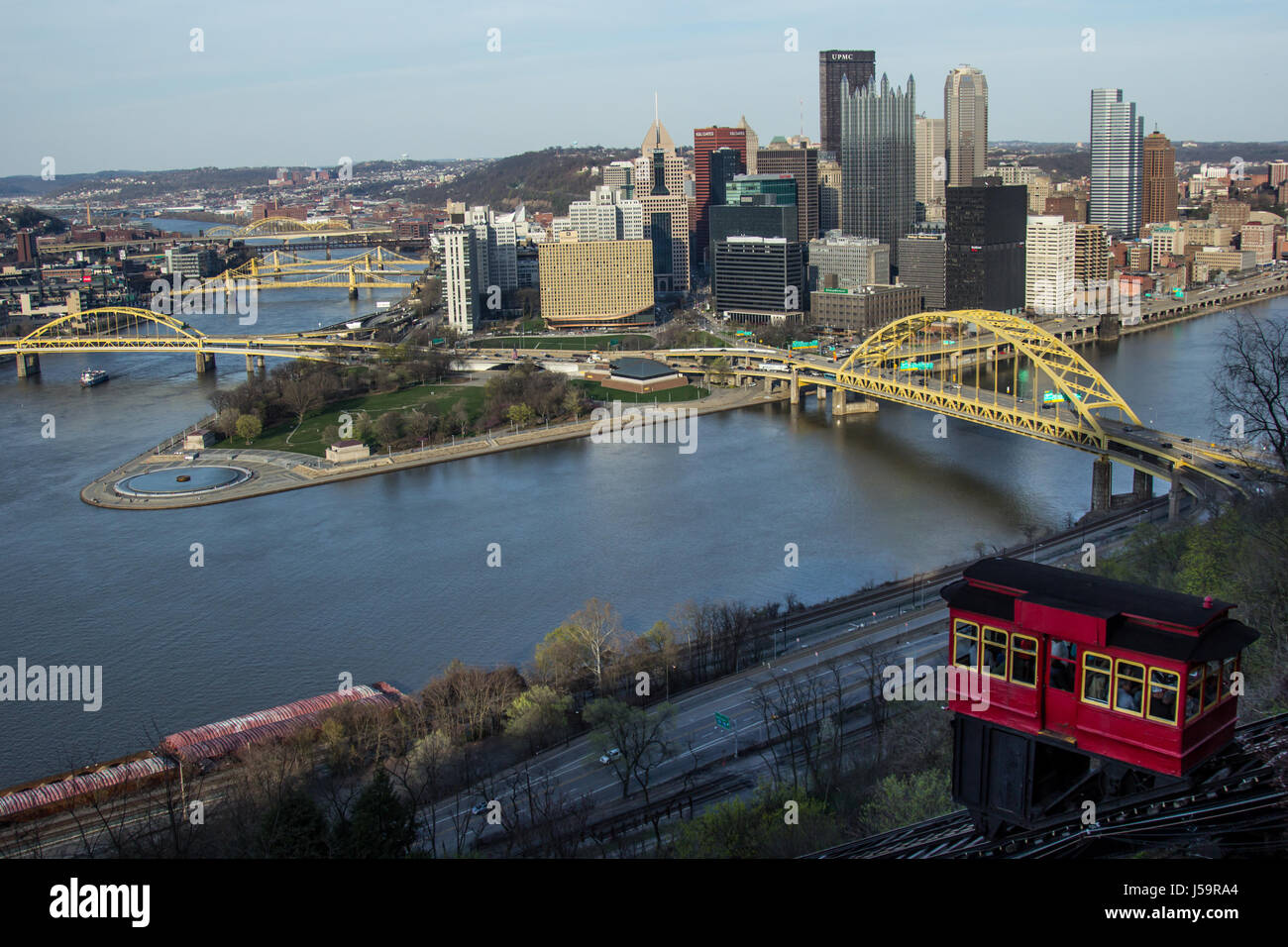 Pittsburgh city skyline from the top of the Duquesne Incline, Mount Washington at sunset with a view of all the bridges and the Point Park Fountain. Stock Photo