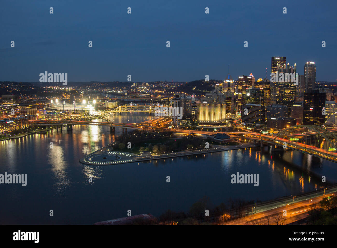 Pittsburgh city skyline from the top of the Duquesne Incline, Mount Washington at Night with a view of all the bridges and the Point Park Fountain. Stock Photo