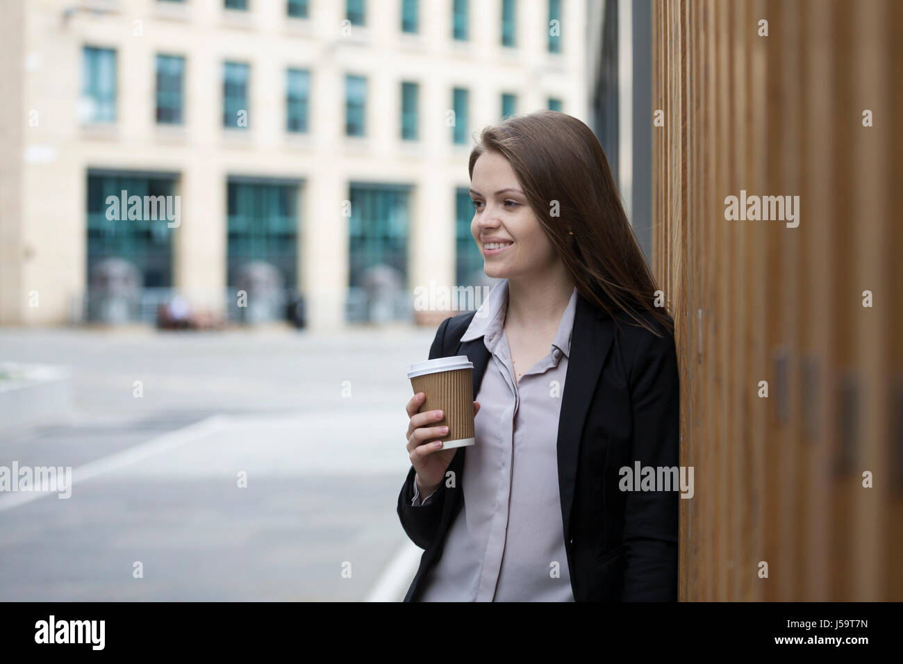 Well dressed woman standing outside hi-res stock photography and images ...