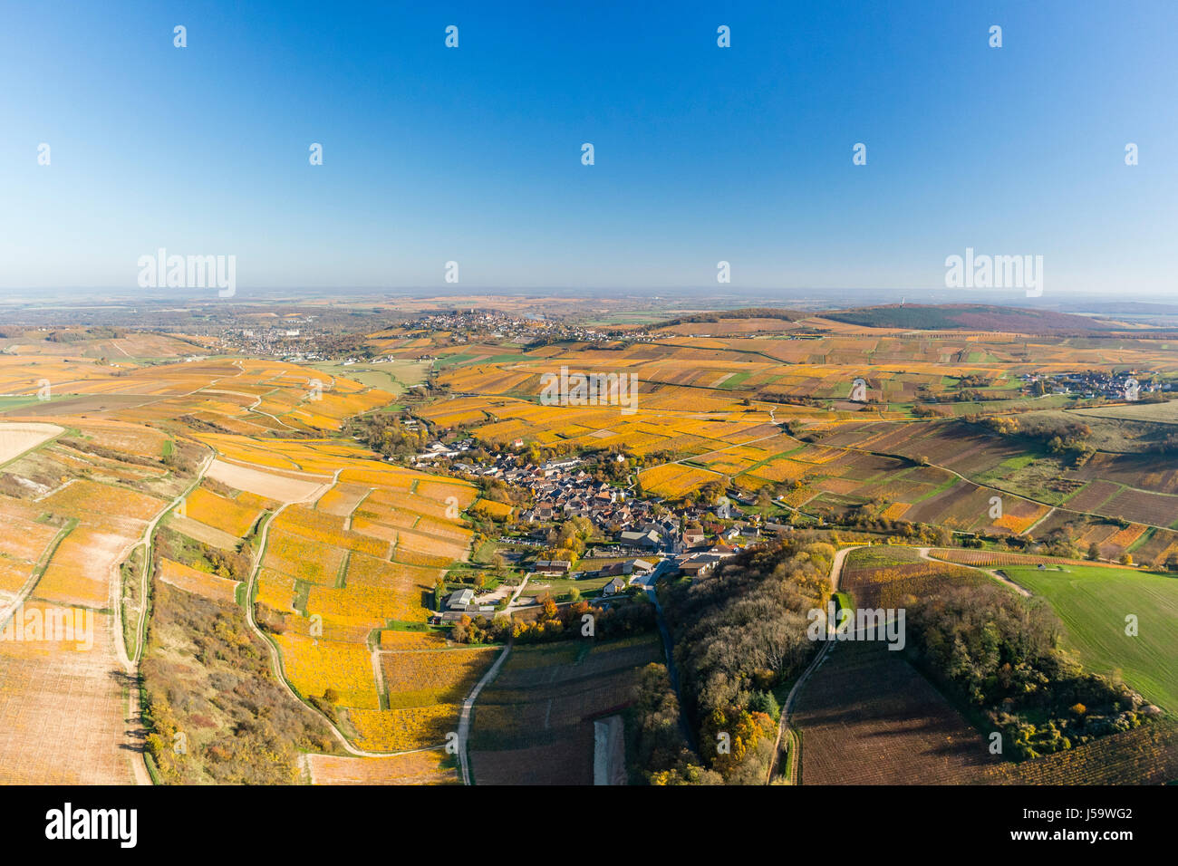 France, Cher, Sancerrois region, Sancerre, the vineyard fall, Chavignol village first and Sancerre on the hill far (aerial view) Stock Photo