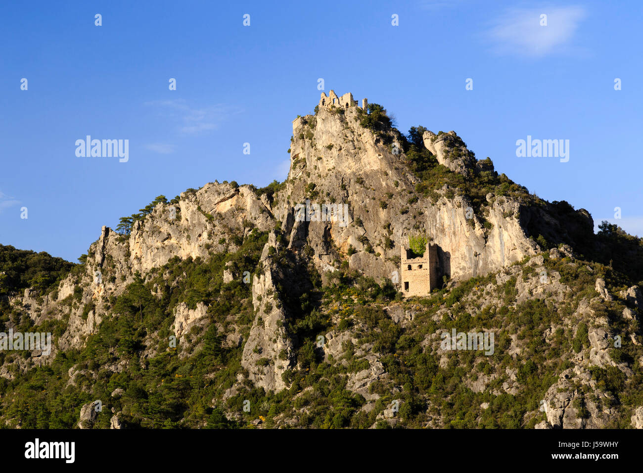 France, Herault, Saint Guilhem le Desert, labelled Les Plus Beaux Villages de France, the Geant castle ruins above the village Stock Photo