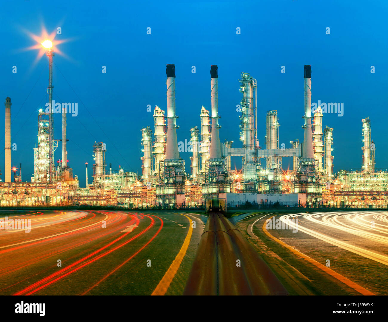 beautiful lighting of oil refinery plant in  heav petrochemicaly industry estate use for power ,energy and petroleum industrial topic Stock Photo