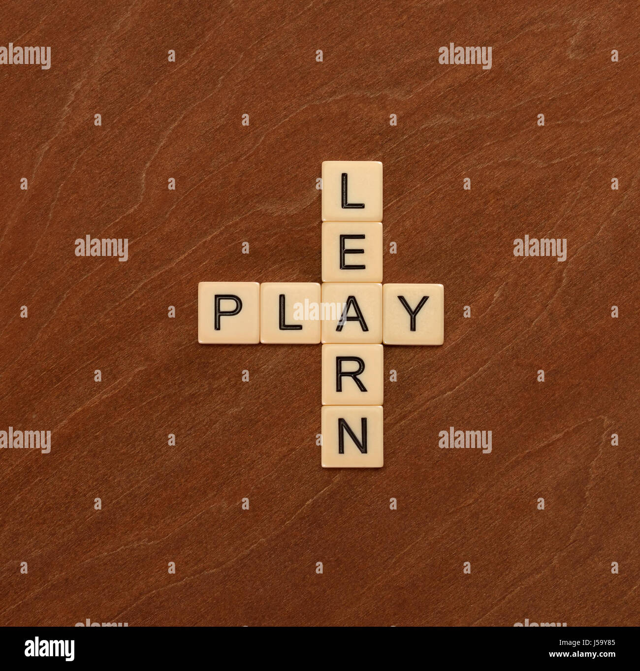 Children playing crossword puzzle game hires stock photography and