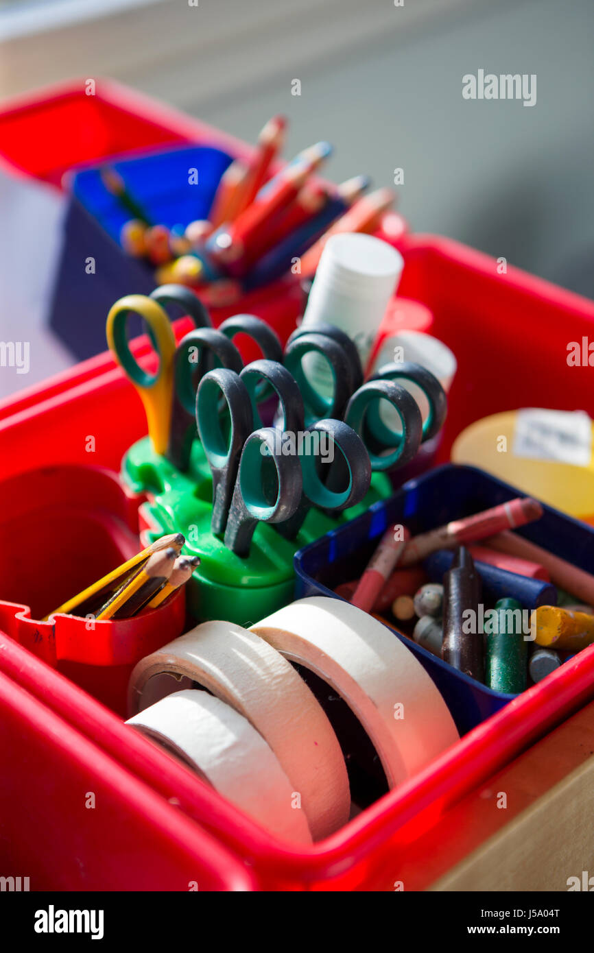 Close up of school equipment in a pot on a table. Stock Photo