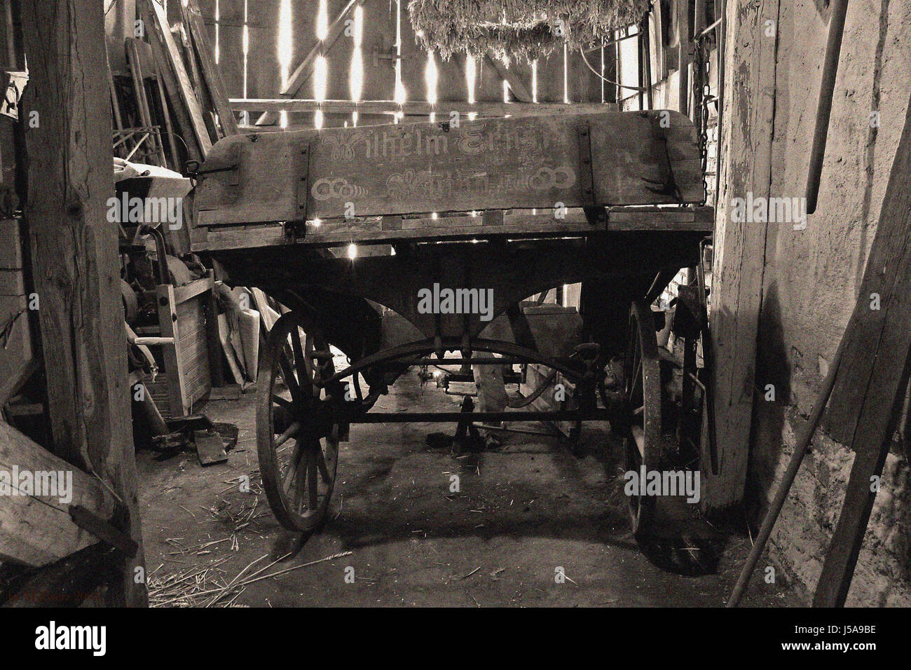 agriculture farming transport barn farmer straw restores carriage and pair Stock Photo