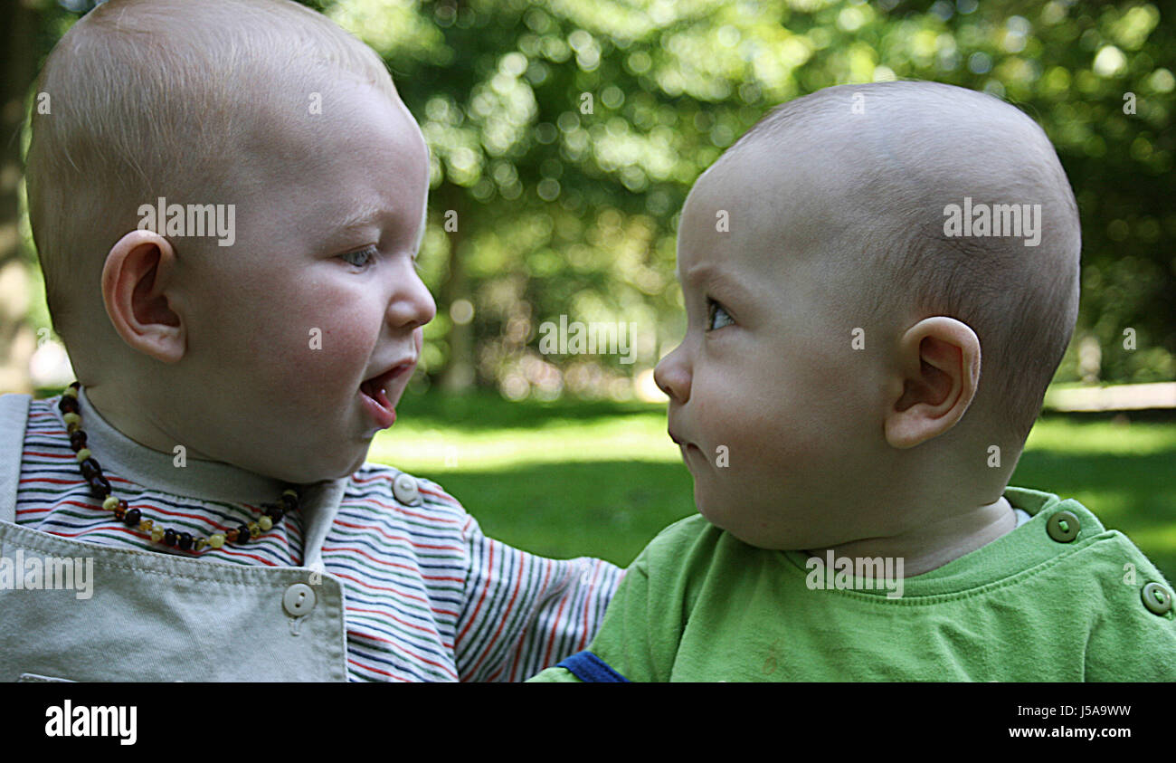 conversation friendship baby youngsters guys child children kids babies toddler Stock Photo