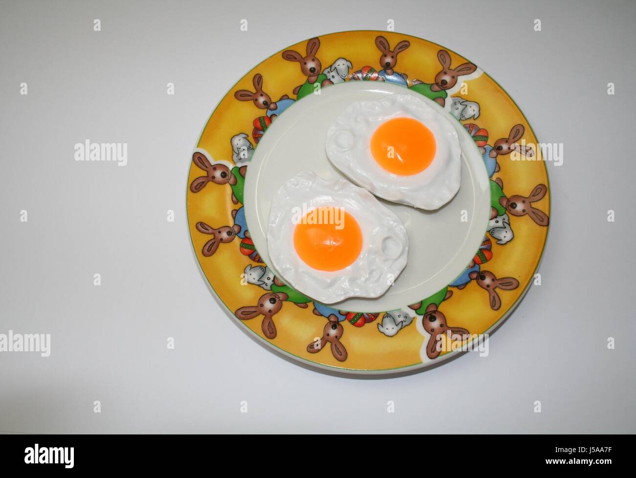 easter plate yolk eggs pitched fried food breakfeast breakfast spiegeleier Stock Photo