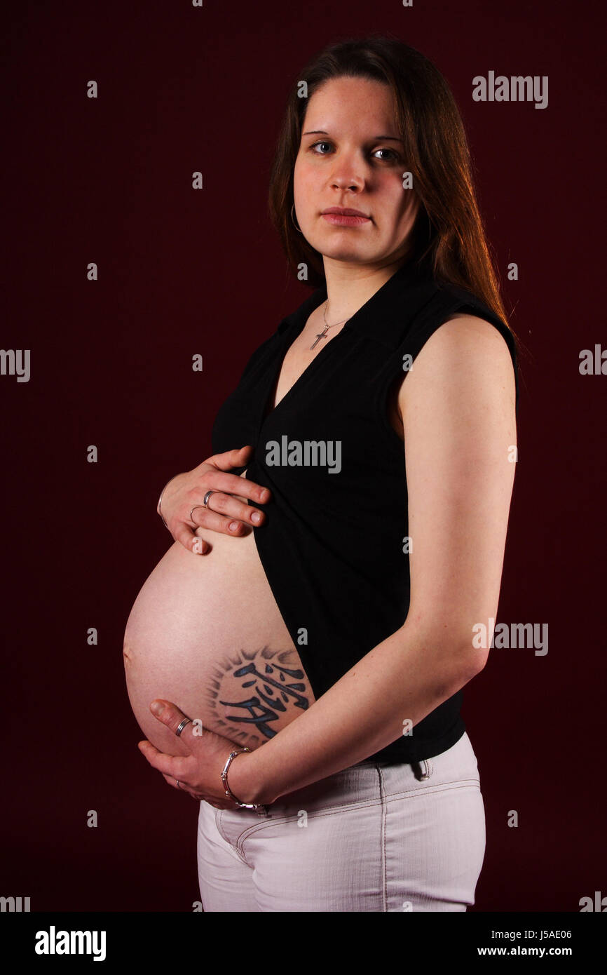 woman baby standing belly tummy pregnantly nascency development thick young Stock Photo